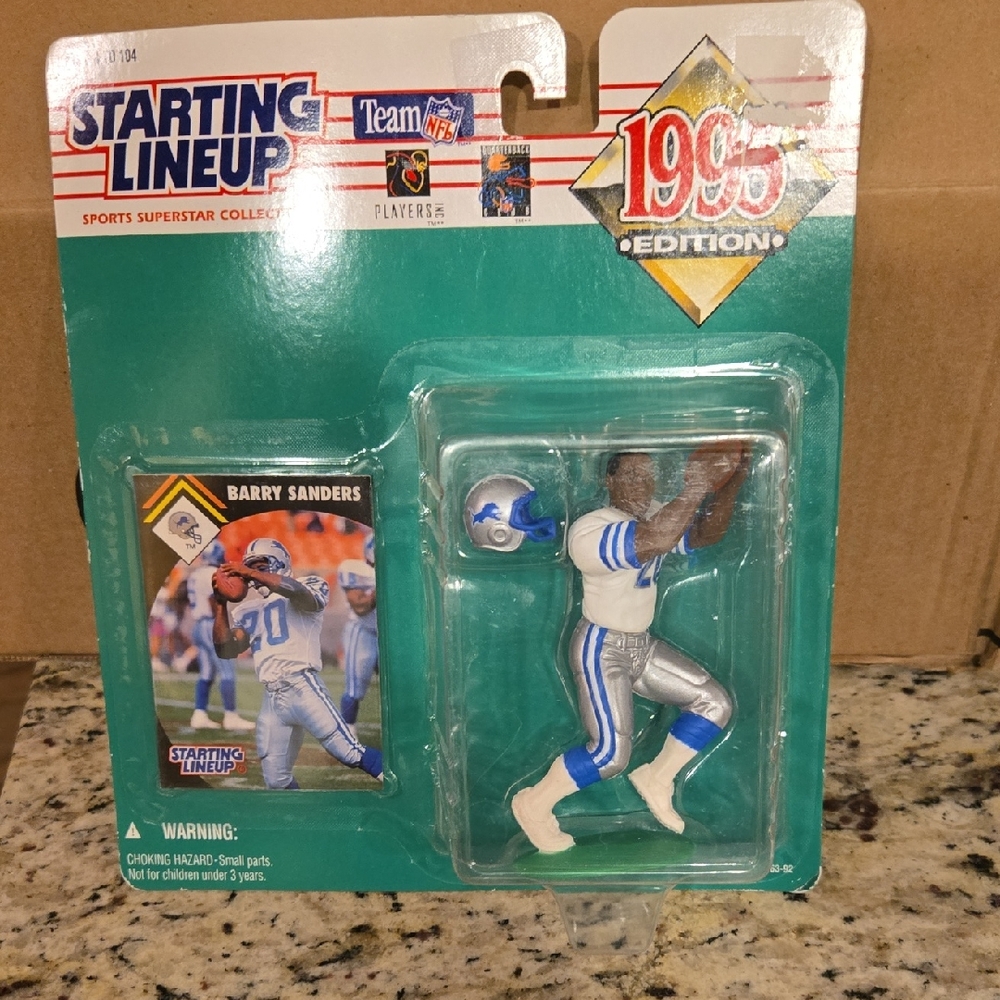 Vintage 1995 Starting Lineup NFL figure featuring Barry Sanders of the Detroit L